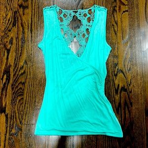 Turquoise blouse, very cute for the summer time.